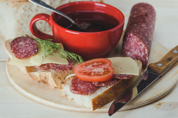 Sandwiches with salami and cheese