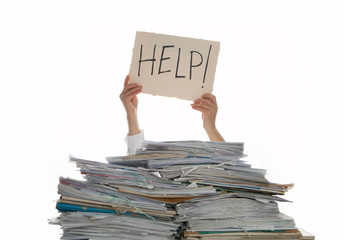 Person under a pile of papers with a hand holding a sign of help. Accounting.