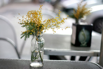 flowers in a vase on table