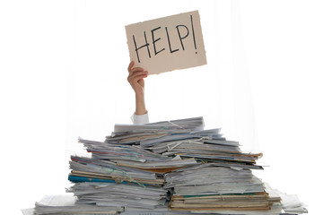 Person under a pile of papers with a hand holding a sign of help. Accounting.