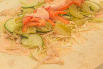 The process of making shaurma, juicy tomato, cucumber, healthy cabbage, meat from the brisket, and all this is shaurma.