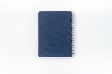 Dark blank blue notebook closed in closeup