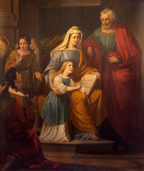 REGGIO EMILIA, ITALY - APRIL 14, 2018: The painting of St. Joachim, little Virgin Mary and st. Ann...