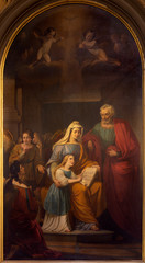 REGGIO EMILIA, ITALY - APRIL 14, 2018: The painting of St. Joachim, little Virgin Mary and st. Ann in church chiesa di San Francesco by unknown artist. © Renáta Sedmáková