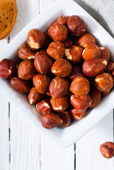 hard shell stone fruits on white wood table background