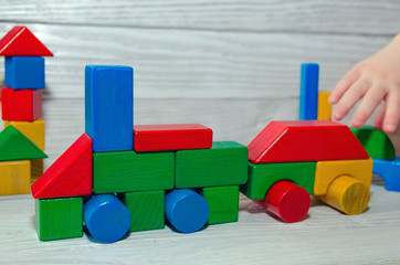 Children's wooden designer from blocks of a different form