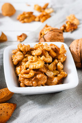 hard shell stone fruits on white wood table background
