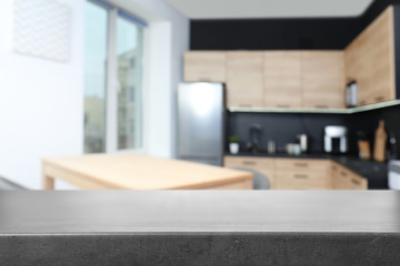Empty table in modern kitchen. Mockup for design