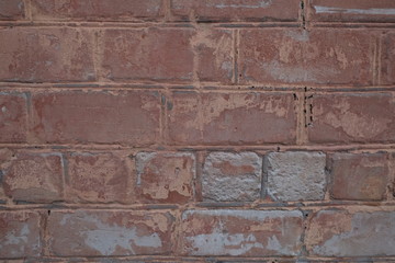testura background of red brick on a walk around the city village Township