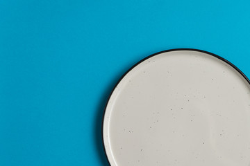 White plate on red background