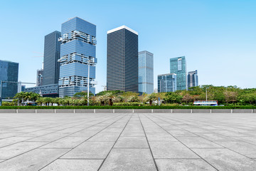 Urban skyscrapers with empty square floor tiles