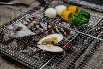 fish and vegetables on the grill