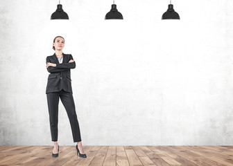 Fototapeta premium Confident businesswoman, full length in empty room