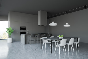 Gray kitchen corner with countertops and table