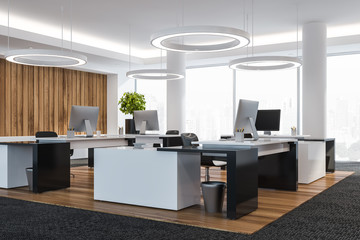 Modern white empty office interior. Work space with computers. 3D render. City view.