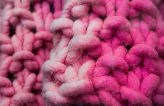 shades of pink knit yarn background