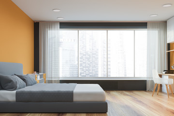 Side view of yellow and gray bedroom