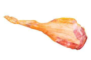 Spanish ham. Closeup of a front leg of traditional spanish Serrano ham (Jamon) or italian parma prosciutto crudo isolated on a white background. Macro. - obrazy, fototapety, plakaty