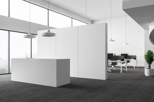 White open space office with reception