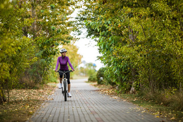 Young woman cycling