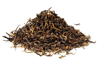 Heap of black tea on white background. Close up. High resolution.