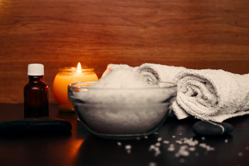 spa setting with candle and sea salt