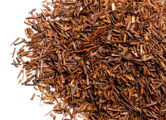 Rooibos tea on white background. Top view. Close up. High resolution