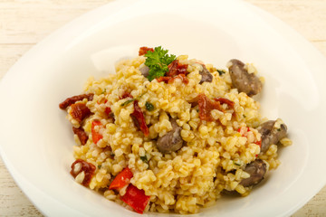 Bulgur with chicken hearts