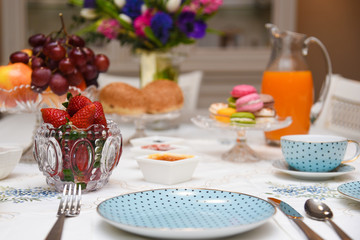 covered table in the restaurant, fruit dessert