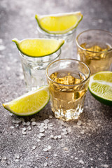 Shots of silver and gold tequila
