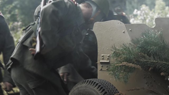 Soldiers make a Anti tank gun ready for fireing