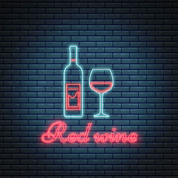 Glass of wine and bottle of red wine with lettering in neon style. Alcohol cocktail bar symbol, logo, signboard.