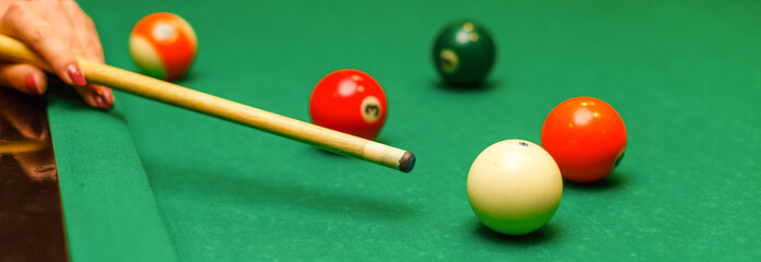 begin playing billiards, shot in white ball