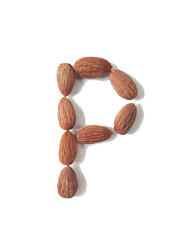 Isolated alphabet letter P made by almonds