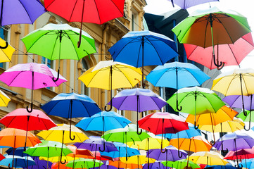 Fototapeta na wymiar Colorful umbrellas background. Colorful umbrellas