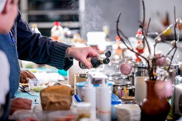 Chef adds sauce to saucepan. Master class in the kitchen. The process of cooking. Step by step. Tutorial. Close-up