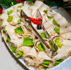 Tortilla, burritos, sandwiches twisted rolls 