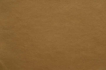 Light brown colored faux leather with a fine texture.