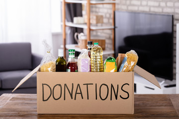 Naklejka na ściany i meble Food Items In Donation Box