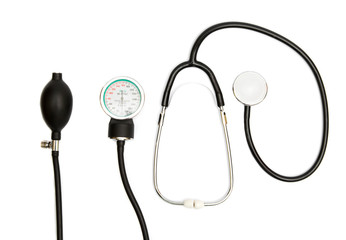 Medical Concept with stethoscope, blood pressure gauge isolated on white. Copy Space. Close up view