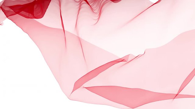 red fabric slowly swaying in the wind