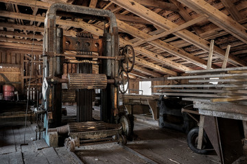 Fototapeta na wymiar An old wood sawmill that is still operational.