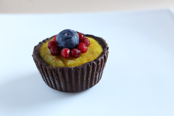 cupcake with blueberry and cowberry