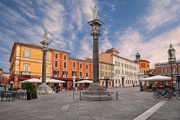 Ravenna, Emilia-Romagna, Italy: the main square Piazza del Popolo with the ancient columns with the statues of Saint Apollinare and Saint Vitale - obrazy, fototapety, plakaty