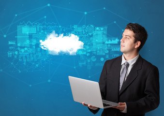 Young smiling person presenting cloud technology concept
