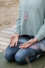 a female practicing yoga and meditation
