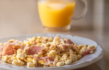 Scrambled eggs and orange juice