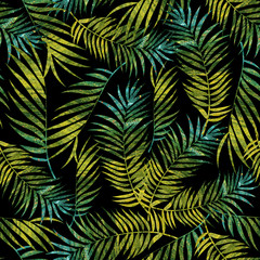 Naklejka na ściany i meble tropical leaves with green and blue colors textures on a dark gray background