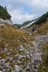 Landscape rocky mountains Styrian Alps in Austria. Peaks of rocky hills with occasionally vegetation.