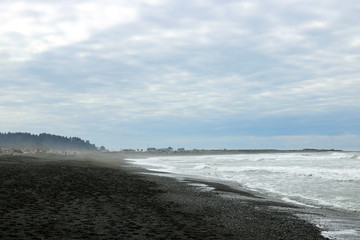 View of the Pacific Coast in the early foggy morning.